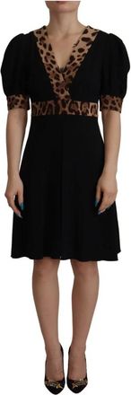 Dolce & Gabbana Elegante Zwarte A-Lijn Jurk met V-Hals - Dames - Korte kleedjes - Zwart - XS - Katoen - Kleedjes