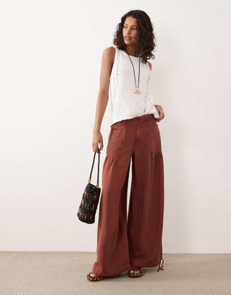 Asos Pantaloni a palloncino color ruggine con tasche sul davanti e fondo regolabile con laccetti-Rosso