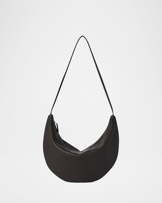 The Row Izzy Small Crescent Shoulder Bag in Leather
