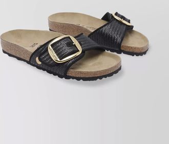 Birkenstock sandals with cork sole and woven texture