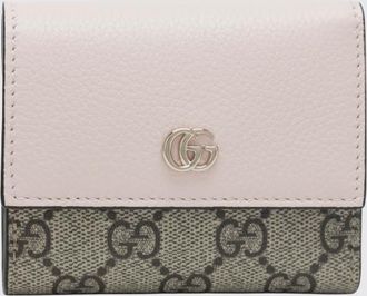 Gucci Portafoglio GG Marmont Gucci in pelle martellata e tessuto GG Supreme