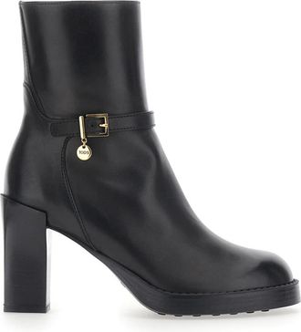 Tod's Enkellaarzen met rubberen zool en 5 cm hak zwart dames - Dames - Laarzen met Hak - Zwart - 39 EU - Leer - Schoenen