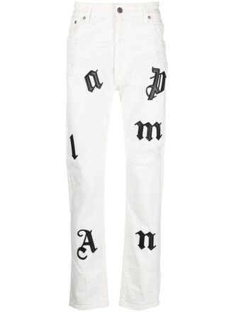 Palm Angels Jeans con effetto vissuto - Bianco
