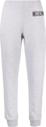 Moschino logo-print track trousers - women - Organic Cotton - 44 - Grey