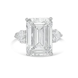 Diana M. Jewels Platinum Lab grown 10ct Emerald diamond ring with heart diamonds on the side and micropave band