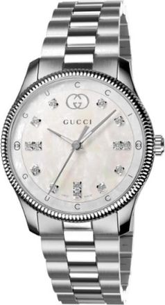 Gucci G-Timeless 29 mm roestvrijstalen kast- witte moeder van pareldial met en lettering- diamanten indexen- roestvrijstalen armband - Dames - Horloges - Gr