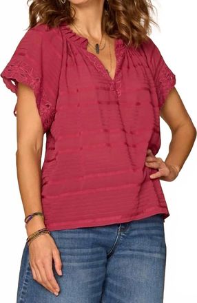Democracy Short Sleeve Ruffle Split Neck Embroidered Woven Top In Beet Red