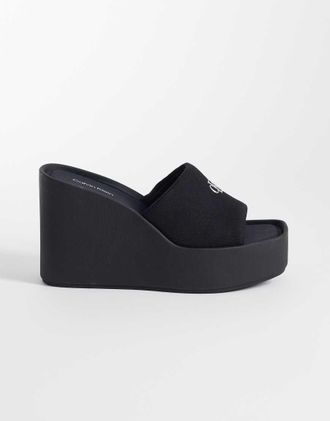 Calvin Klein Jeans - Sandali neri in tela con zeppa-Nero
