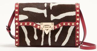 Valentino Garavani Valentino Garavani Rockstud small shoulder bag in pony-effect calfskin Wo