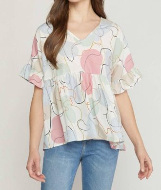 Entro Abstract Peplum Top In Cream