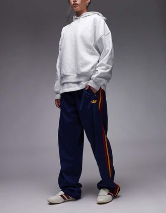 adidas Originals Firebird - Pantaloni sportivi blu navy e gialli