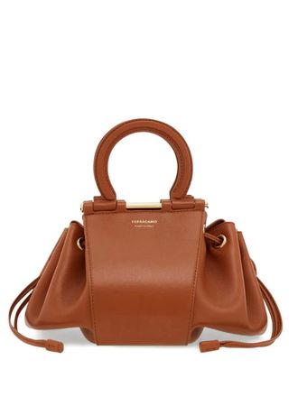 Ferragamo Gancini-detail bucket bag - women - CALFSKIN - One Size - Brown