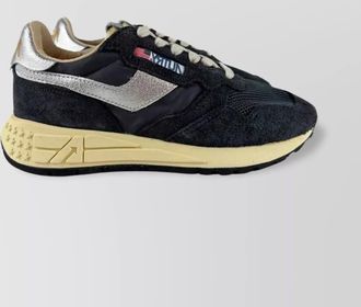 Autry low top sneakers featuring silver accents