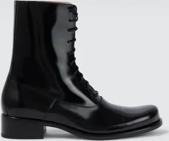 The Row Kai patent leather lace-up boots