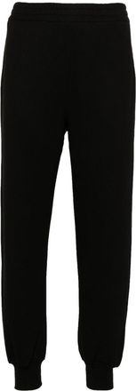 Alexander McQueen logo-print track pants - women - Cotton/Cotton - 36 - Black