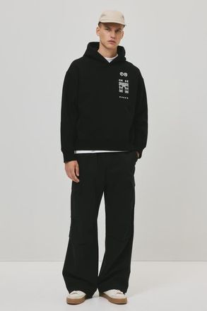 H&M Loose Fit Hoodie in Black/paris at Nordstrom, Size X-Large