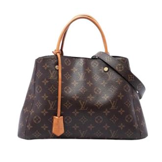 Louis Vuitton Pre-owned Montaigne MM - Dames - Pre-owned - Bruin - Maat: ONE Size Leer