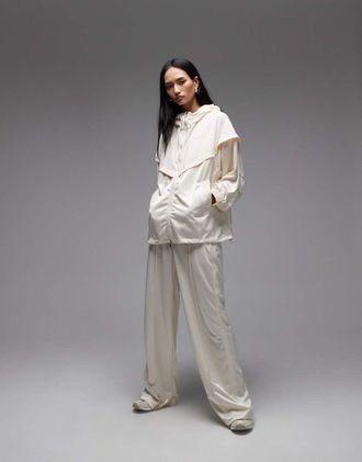 Nike Pantaloni dritti color panna con cintura-Bianco