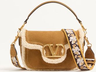 Valentino Garavani Valentino Garavani Alltime suede shoulder bag with sheepskin lining and embroidered ribbon shoulder strap Wo