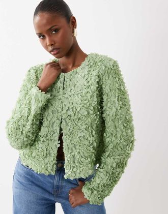 Vila Top in jacquard a fiori verde fumo con fermaglio sul davanti