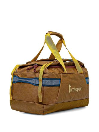 Cotopaxi logo-print top-handle holdall - unisex - Fabric - OS - Brown