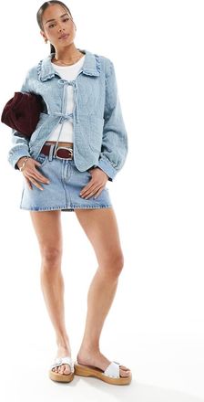 Only quilted tie front shacket with ruffle collar detail in light blue denim