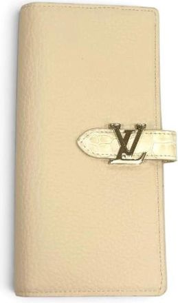 Louis Vuitton Pre-owned Taurillon Clemence Vertical Wallet - Dames - Vintage Accessoires - Beige - ONE Size - Leer - Vintage