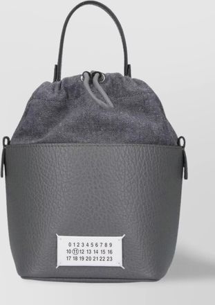 Maison Margiela leather bucket bag with top handle and adjustable strap