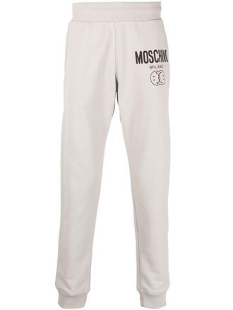 Moschino logo print tapered sweatpants - Grey