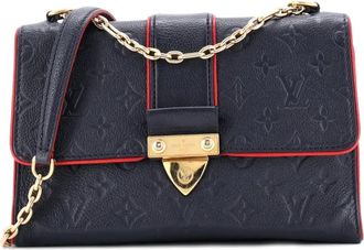 Louis Vuitton Saint Sulpice Empreinte leren PM crossbodytas met monogram - Blauw