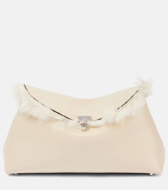 Toteme T-Lock shearling-lined leather clutch