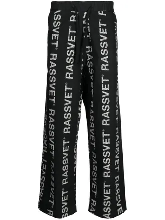 Rassvet logo-print wide-leg trousers - men - Cotton/Elastane - M - Black