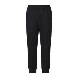 Emporio Armani Joggers in jersey interlock misto lyocell con lettering jacquard - - Trousers - Uomo - Nero - M