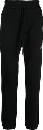 Amiri logo-embroidered cotton track pants - men - Cotton/Lyocell - L - Black