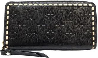 Louis Vuitton Pre-owned Monogram Empreinte Long wallet (bi-fold) - Dames - Vintage Accessoires - Zwart - ONE Size - Leer - Vintage