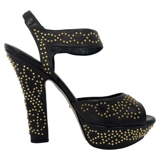 Sergio Rossi Sergio Rossi platform sandalen met studs en enkelbandje in zwart leer