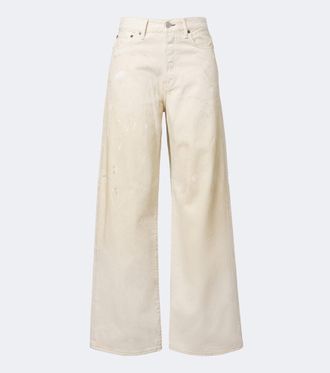 Acne Studios Jeans distressed a gamba larga con pelle