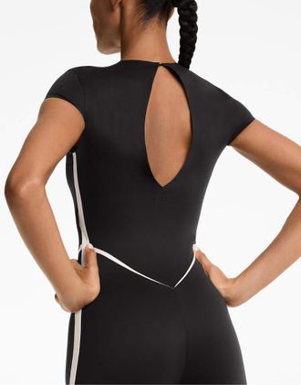 Oysho Perfect Adapt - Tuta jumpsuit nera con riga laterale-Nero