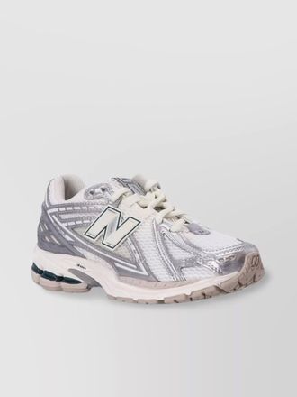 New Balance paneled low-top sneakers
