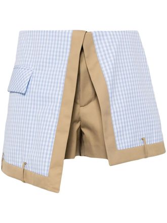 BESFXXK check-print asymmetric shorts - Blue