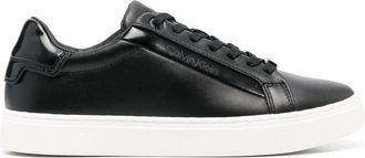 Calvin Klein debossed-logo detail sneakers - women - Leather - 36 - Black