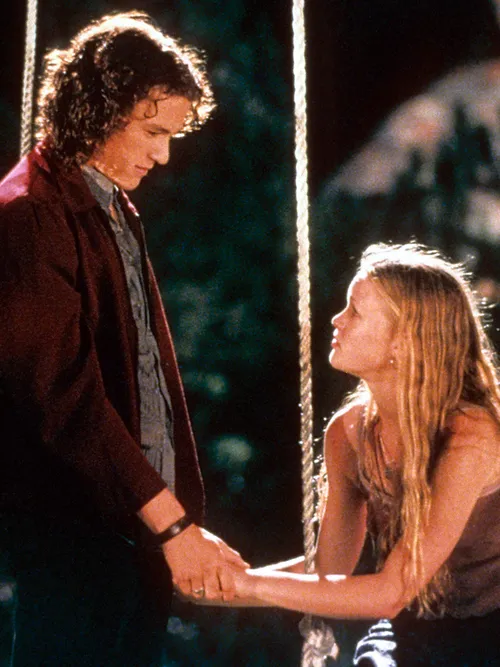 Heath Ledger and Julia Stiles at swing in a scene from the film '10 Things I Hate About You', 1999. , The 13 hottest rom-com actors of the century