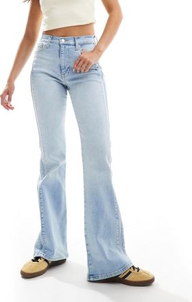 Tommy Jeans Slyvia - Jeans a zampa e a vita medio alta lavaggio chiaro-Blu