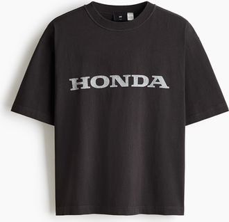 H&M Bedrucktes T-Shirt in Loose Fit - Schwarz/Honda