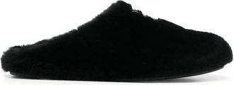 Givenchy logo-plaque shearling slides - women - Lamb Fur/Calf Leather/Calf Leather/Calf Leather - 35 - Black