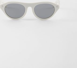 Prada sunglasses with the iconic metal plaque