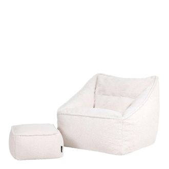 Icon Brand Sill&oacute;n puf y reposapi&eacute;s cuadrado en tejido borg boucl&eacute; color crema