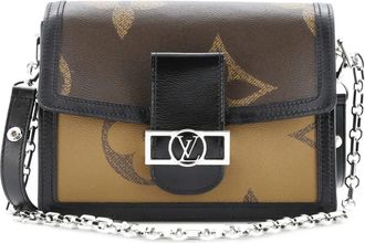 Louis Vuitton Dauphine Reverse MM grote crossbodytas met monogram - Bruin