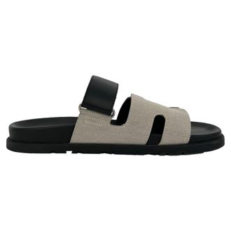 Herm&egrave;s Herm&egrave;s Chypre sandalen in wit en zwart canvas en leer