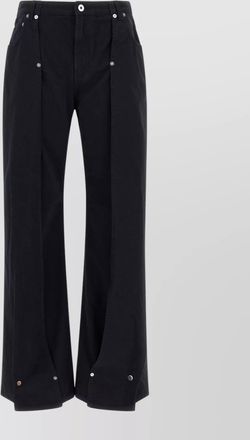 Jean Paul Gaultier the snap-button denim trousers